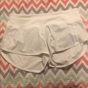 WHITE LULULEMON SHORTS SIZE 4